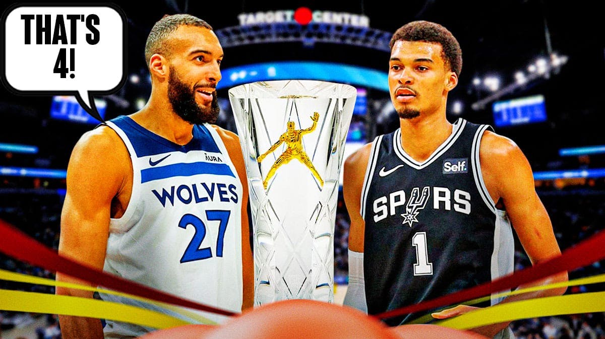Timberwolves' Rudy Gobert saying "That's 4" next to Victo Wembanyama with Defensive Player of the Year award