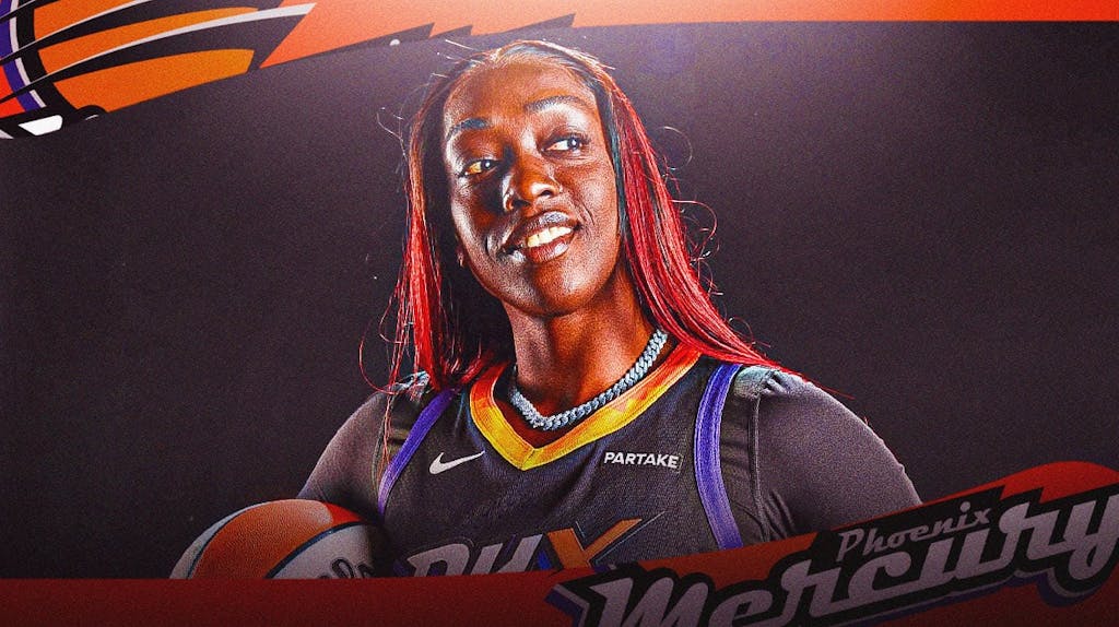 Kahleah Copper in her Phoenix Mercury jersey with the Mercury arena in the background