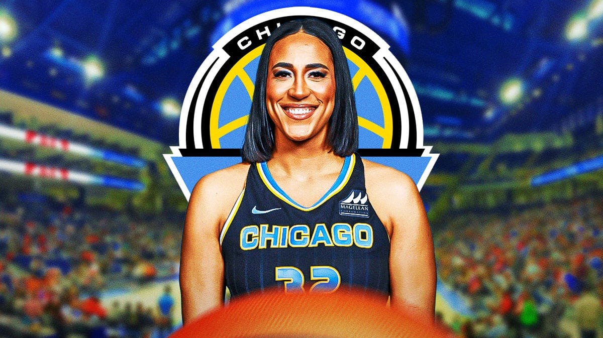 Chicago Sky's Taya Reimer stands in front roster with Angel Reese, Kamilla Cardoso in background