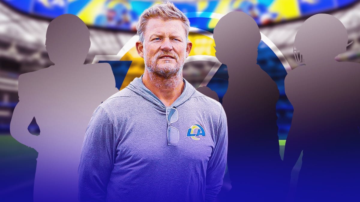 Les Snead in the middle, 3 mystery players around him, Los Angeles Rams wallpaper in the background