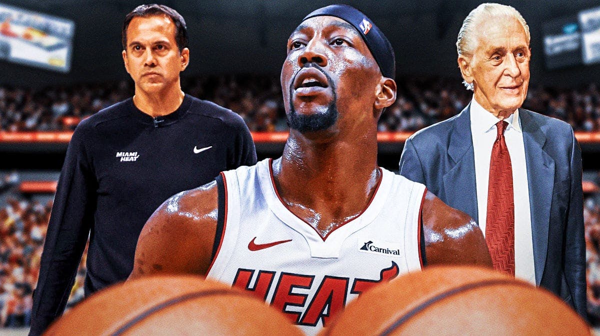 Miami Heat star Bam Adebayo in the middle of Erik Spoelstra and Pat Riley in front of the Kaseya Center.