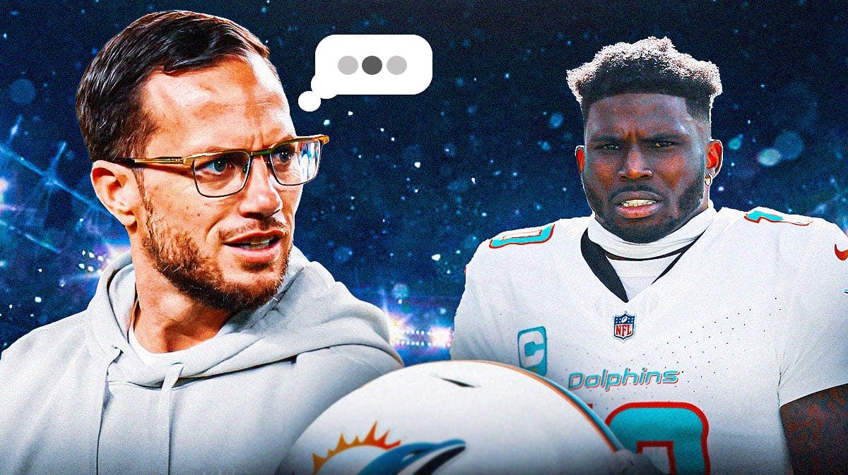 Miami Dolphins head coach MIke McDaniel next to Miami Dolphins wide receiver Tyreek Hill. Mike McDaniel has a speech bubble with iMessage three dots/ellipsis.