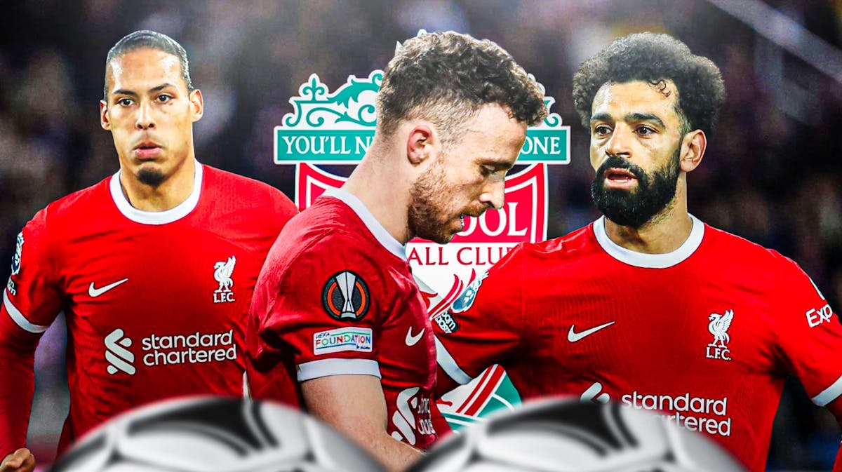 Diogo Jota, Virgil van Dijk, Mohamed Salah all looking down/sad in front of the Liverpool logo